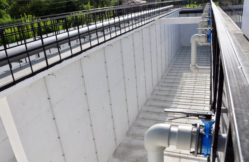 Chortkiv - Ternopil - Ukraine - May 2, 2018. The first stage of the reconstructed urban sewage treatment facilities. Corridor aerotanks for artificial biological sewage treatment were constructed. Chortkiv - Ternopil - Ukraine - May 2, 2018. The first stage of the reconstructed urban sewage treatment facilities. Corridor aerotanks for artificial biological sewage treatment were constructed