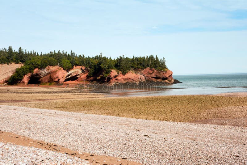 Famous sandstone St Martins sea caves at low tide, Bay of Fundy shore, New Brunswick, Canada. Famous sandstone St Martins sea caves at low tide, Bay of Fundy shore, New Brunswick, Canada