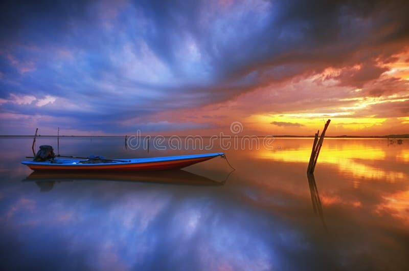 Fisherman boat during sunrise Malaysia village. Fisherman boat during sunrise Malaysia village