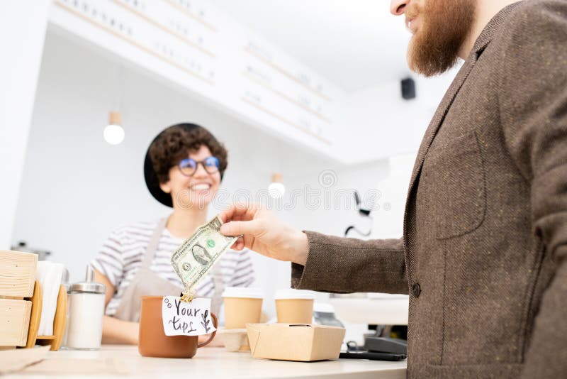 Αναχώρηση της άκρης για το φιλικό barista στοκ εικόνες Αναχώρηση της άκρης για το φιλικό barista στοκ εικόνες