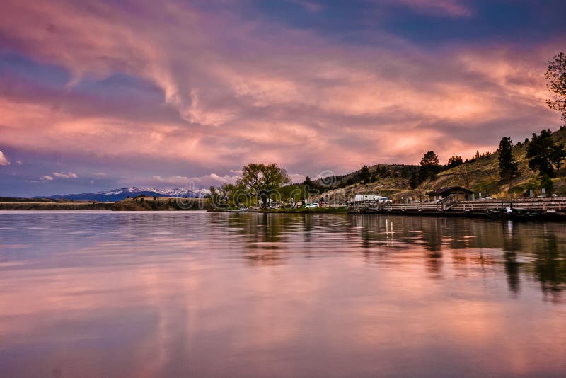 Reflections of a Scenic Sunset in the Waters of Hauser Lake, Montana in the USA. Reflections of a Scenic Sunset in the Waters of Hauser Lake, Montana in the USA