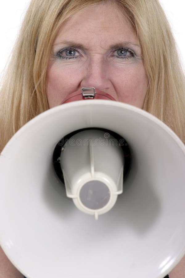 Close-up of a beautiful woman shouting through a megaphone. Shot isolated on white. If at all possible, please let me know where I can see my images in use. Close-up of a beautiful woman shouting through a megaphone. Shot isolated on white. If at all possible, please let me know where I can see my images in use.