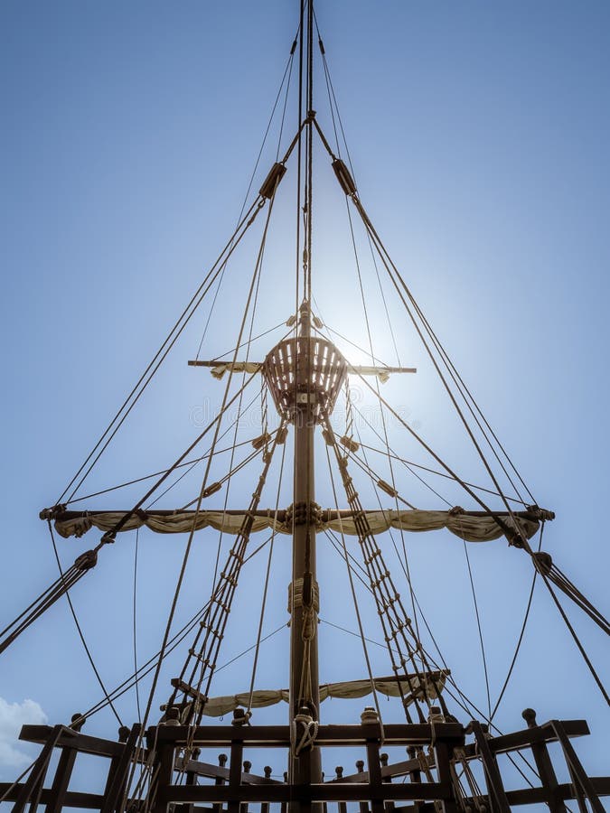 Low angle view of the mast of the historical replica carrack ship Nao Victoria in Seville, Andalusia, Spain. Low angle view of the mast of the historical replica carrack ship Nao Victoria in Seville, Andalusia, Spain