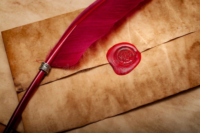 Candlelit scene of a blank grungy paper and an old envelope sealed with red wax and pentagram seal. Candlelit scene of a blank grungy paper and an old envelope sealed with red wax and pentagram seal