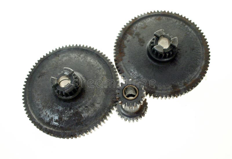 Cogs, sprockets or gears connected, isolated. illustrates teamwork, business networking or connections, also production, factory work or keeping wheels in motion. Cogs, sprockets or gears connected, isolated. illustrates teamwork, business networking or connections, also production, factory work or keeping wheels in motion