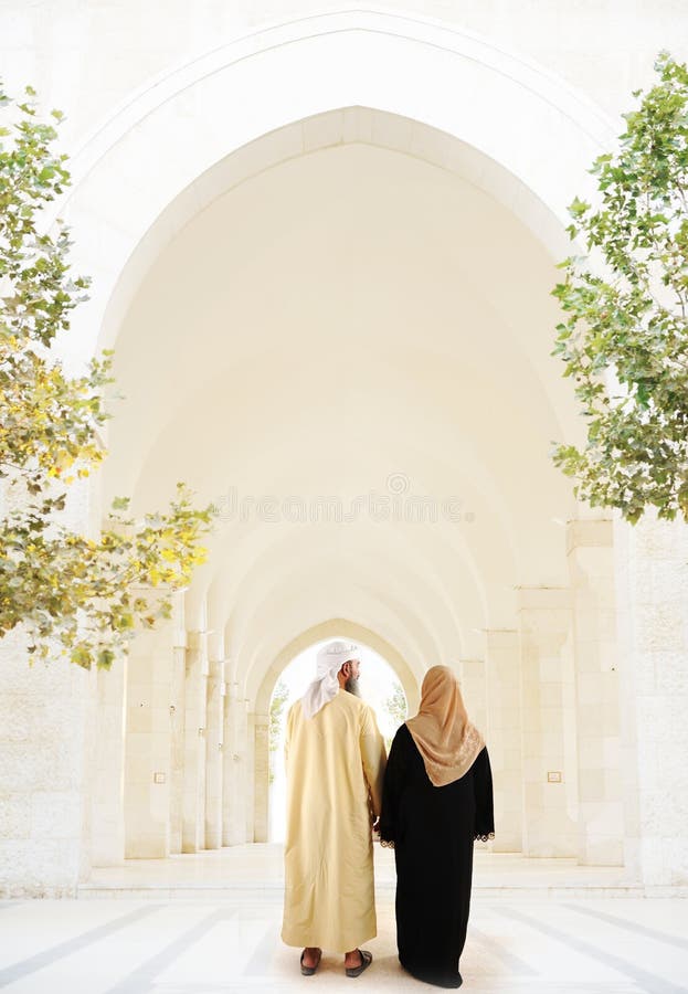 Arabic Muslim couple, are walking. Arabic Muslim couple, are walking