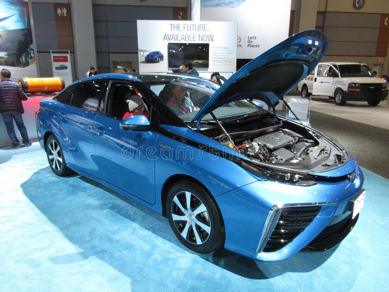 Photo of Toyota mirai fuel cell car at the washington dc auto show on 2/3/18. This car runs on hydrogen by converting it to electricity to run an electric motor. Photo of Toyota mirai fuel cell car at the washington dc auto show on 2/3/18. This car runs on hydrogen by converting it to electricity to run an electric motor.