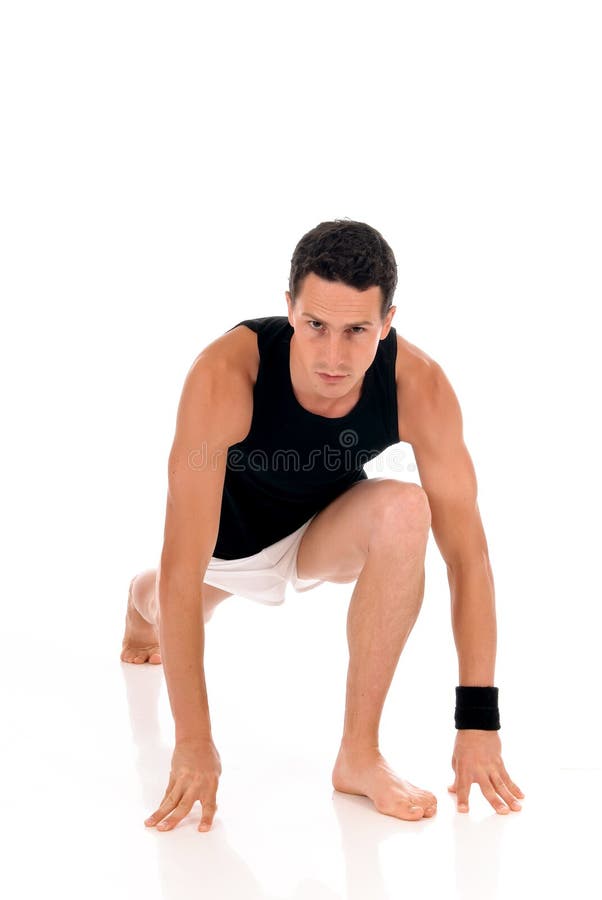 Young handsome male athlete working out, fitness Studio shot. Young handsome male athlete working out, fitness Studio shot.