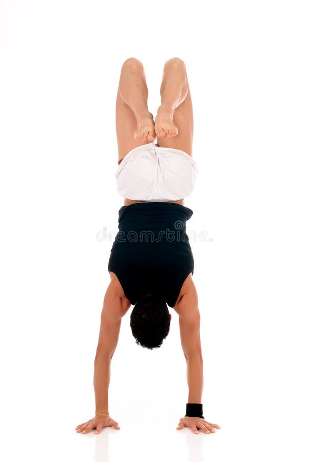 Young handsome male athlete working out, fitness Studio shot. Young handsome male athlete working out, fitness Studio shot.