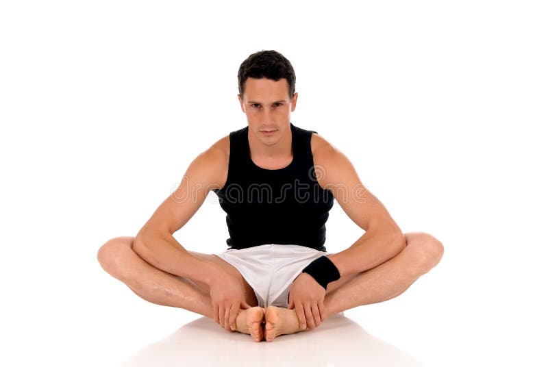 Young handsome male athlete working out, fitness Studio shot. Young handsome male athlete working out, fitness Studio shot.