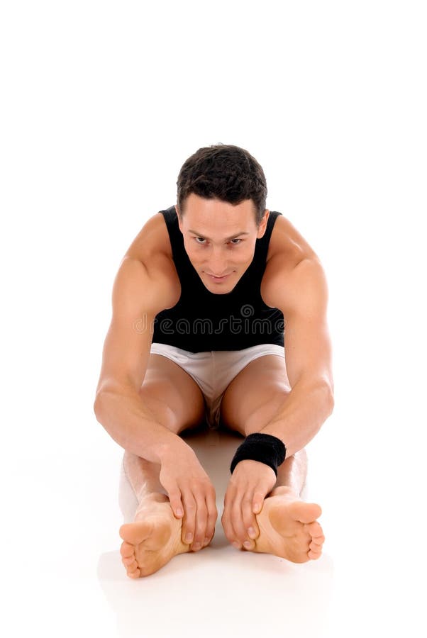 Young handsome male athlete working out, fitness Studio shot. Young handsome male athlete working out, fitness Studio shot.