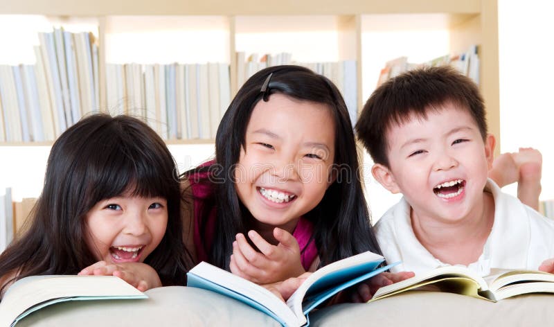 Asian kids lying on the floor. Asian kids lying on the floor