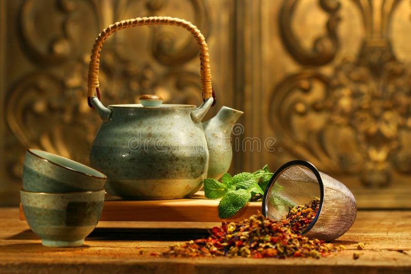 Asian herb tea on an old rustic table. Asian herb tea on an old rustic table