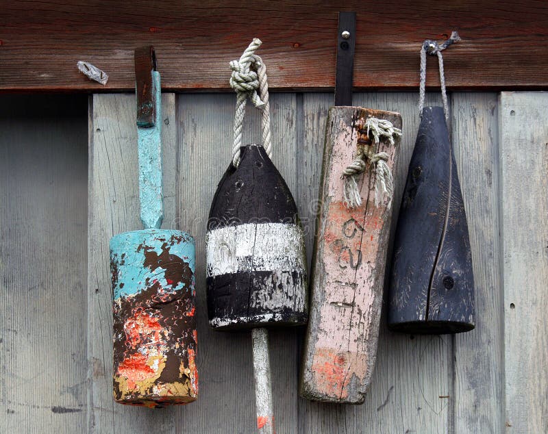 Old lobster buoys hanging from a fisherman's shack. Old lobster buoys hanging from a fisherman's shack