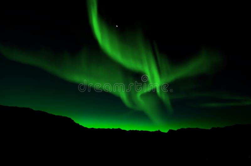 Beautiful northern lights over mountain. Beautiful northern lights over mountain
