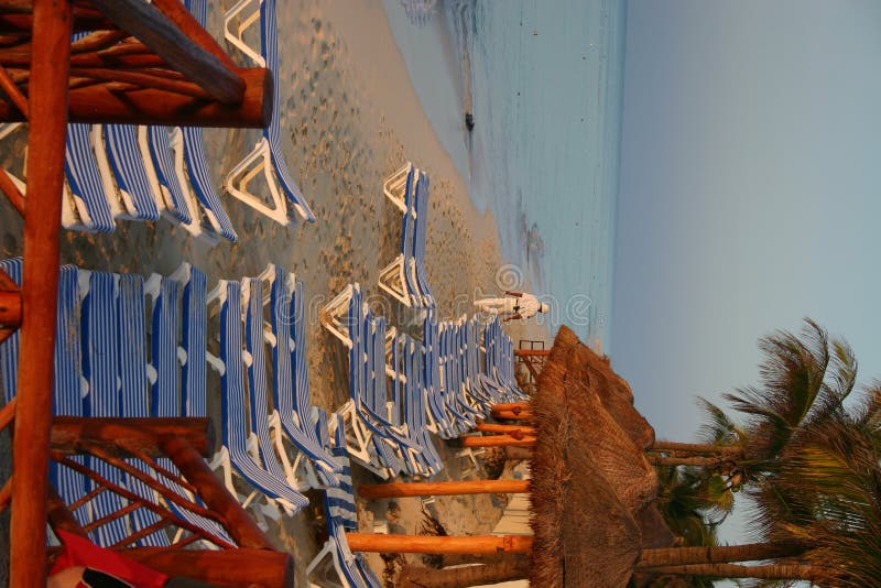 A security guard patrols a Mexican beach at a resort near Playa del Carmin, Mexico. A security guard patrols a Mexican beach at a resort near Playa del Carmin, Mexico.