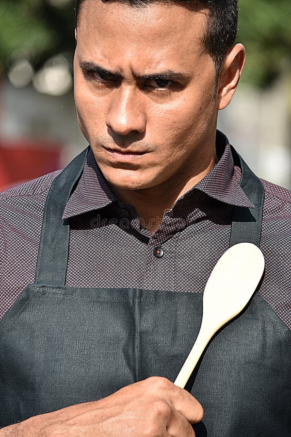Αυστηρά ενήλικα αρσενικά αρχιμάγειρας ή Cook στοκ εικόνες Αυστηρά ενήλικα αρσενικά αρχιμάγειρας ή Cook στοκ εικόνες