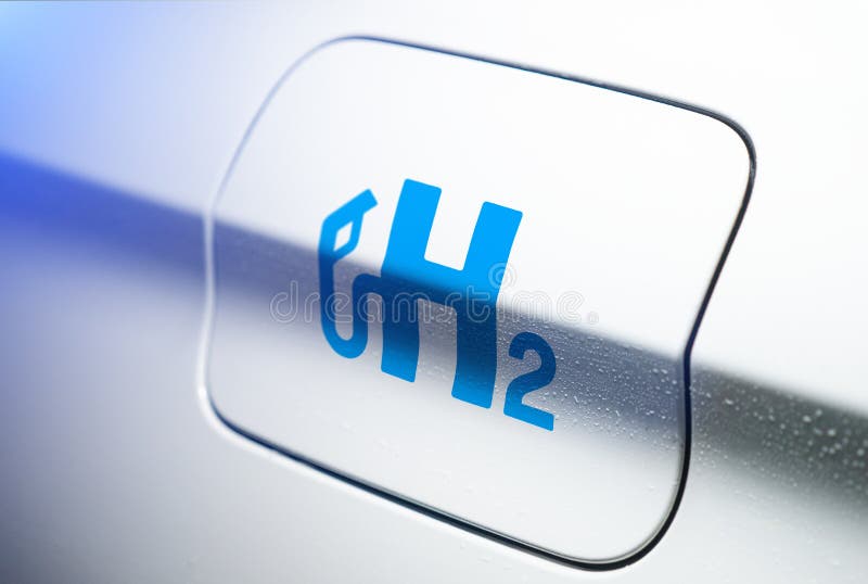 Aachen / Germany - January 31 2020: Car with hydrogen logo on filler cap. h2 combustion engine for emission free ecofriendly transport. Aachen / Germany - January 31 2020: Car with hydrogen logo on filler cap. h2 combustion engine for emission free ecofriendly transport