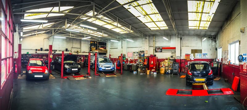 Auto car repair shop / garage workshop with cars. Auto car repair shop / garage workshop with cars.