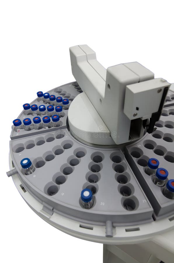 Automatic sample handling of analytical instrument isolates on white. Automatic sample handling of analytical instrument isolates on white