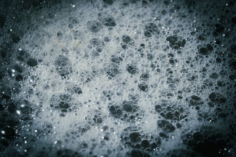 Foam bubbles abstract background. Shallow depth of field. Toned. Foam bubbles abstract background. Shallow depth of field. Toned