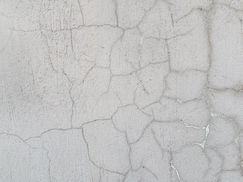 Αφηρημένο φόντο με υφή ραγισμένου γκρι τσιμεντένιου τοίχου στοκ εικόνες
