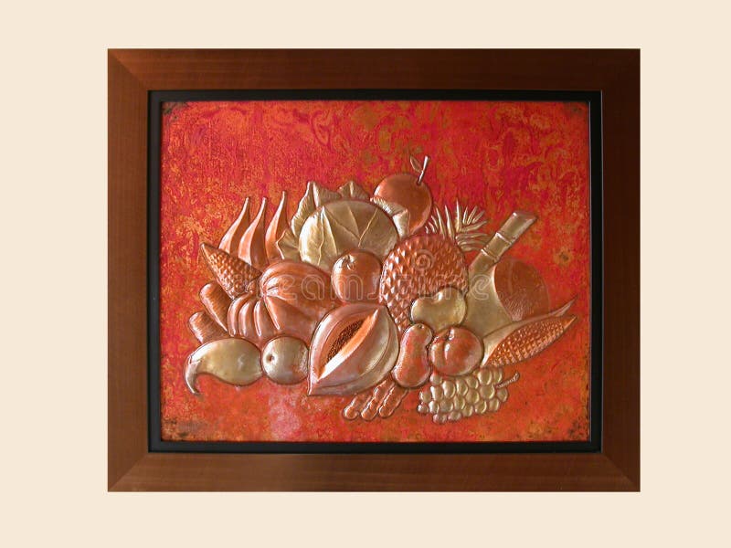 An image of african art in a wooden frame. The art is made of copper metal which is beaten to form the relief image of fruit and vegetables and then heated over a wood fire to give the metal colouring as the metal cools salt is rubbed in to help bring out the colours. An image of african art in a wooden frame. The art is made of copper metal which is beaten to form the relief image of fruit and vegetables and then heated over a wood fire to give the metal colouring as the metal cools salt is rubbed in to help bring out the colours.