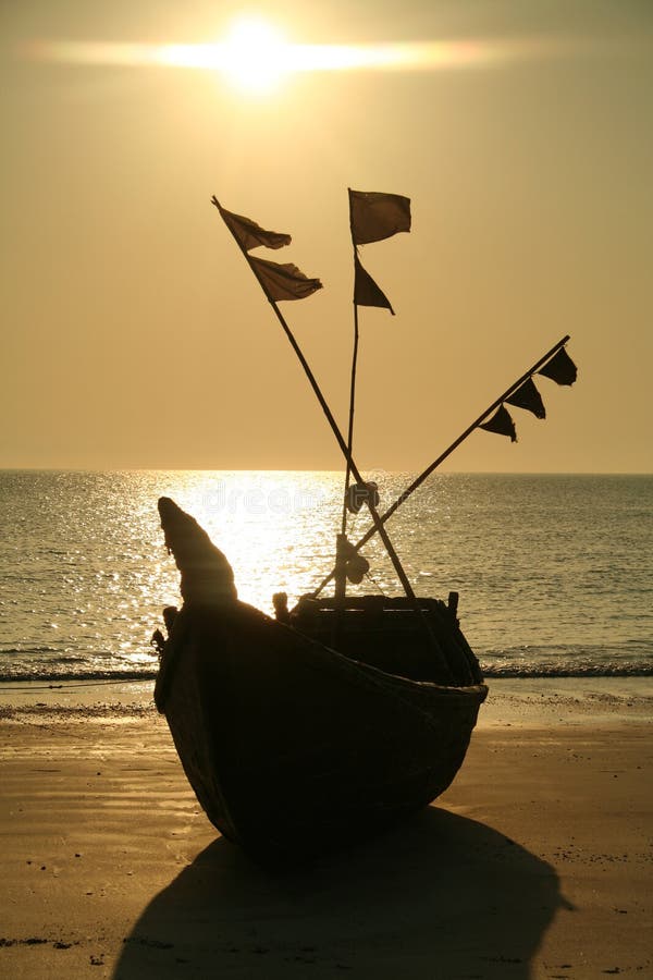 Boat resting on a beach on St. Martins Island, Bangladesh. Boat resting on a beach on St. Martins Island, Bangladesh