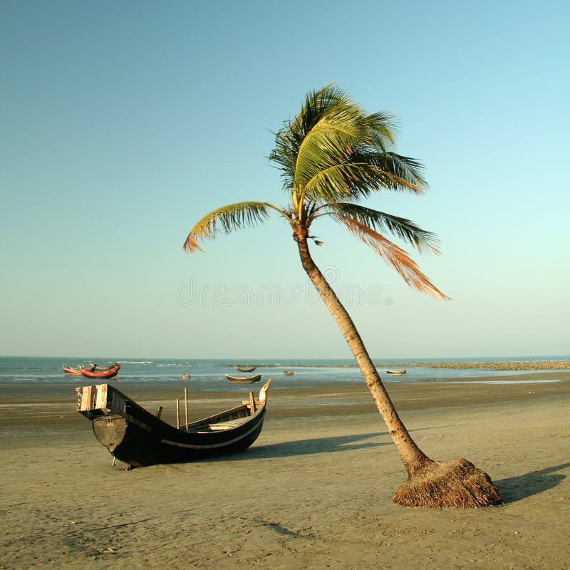 Boat resting on a beach on St. Martins Island, Bangladesh. Boat resting on a beach on St. Martins Island, Bangladesh