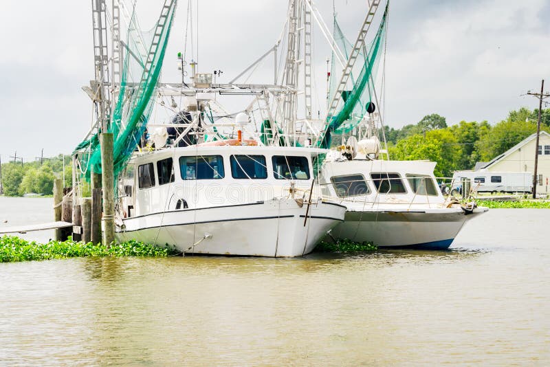 Shrimp boats on Bayou Lafourche in South Louisiana. Shrimp boats on Bayou Lafourche in South Louisiana.