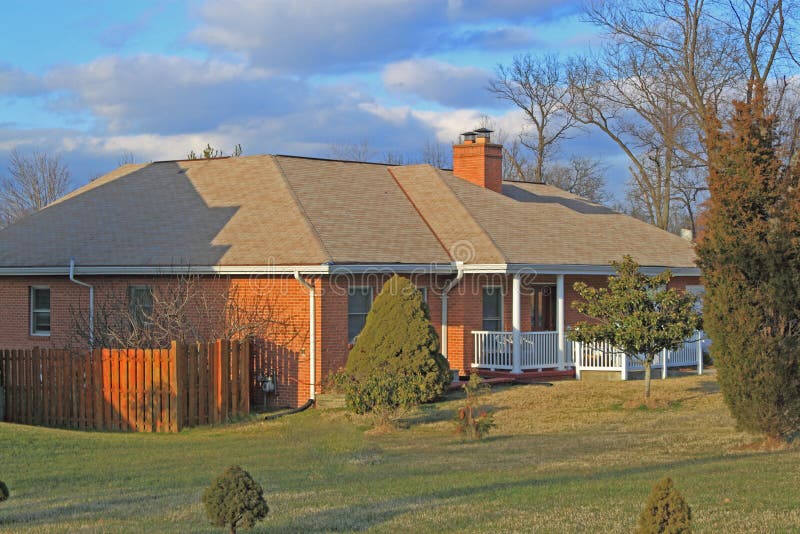 One Story Ranch Home at cloudy day. One Story Ranch Home at cloudy day