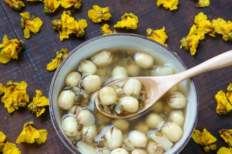 Vietnamese food, sweet lotus seed gruel, ingredients: lotus bean, mung bean, water chestnut and sugar candy. this Vietnam dish for dessert or snack, very delicious, tasty, nutrition, make sleep well. Vietnamese food, sweet lotus seed gruel, ingredients: lotus bean, mung bean, water chestnut and sugar candy. this Vietnam dish for dessert or snack, very delicious, tasty, nutrition, make sleep well