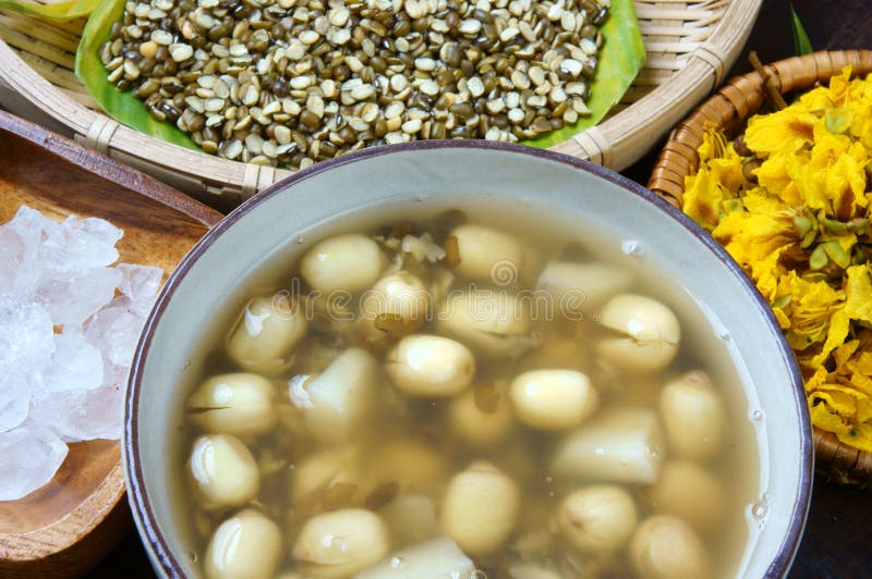 Vietnamese food, sweet lotus seed gruel, ingredients: lotus bean, mung bean, water chestnut and sugar candy. this Vietnam dish for dessert or snack, very delicious, tasty, nutrition, make sleep well. Vietnamese food, sweet lotus seed gruel, ingredients: lotus bean, mung bean, water chestnut and sugar candy. this Vietnam dish for dessert or snack, very delicious, tasty, nutrition, make sleep well