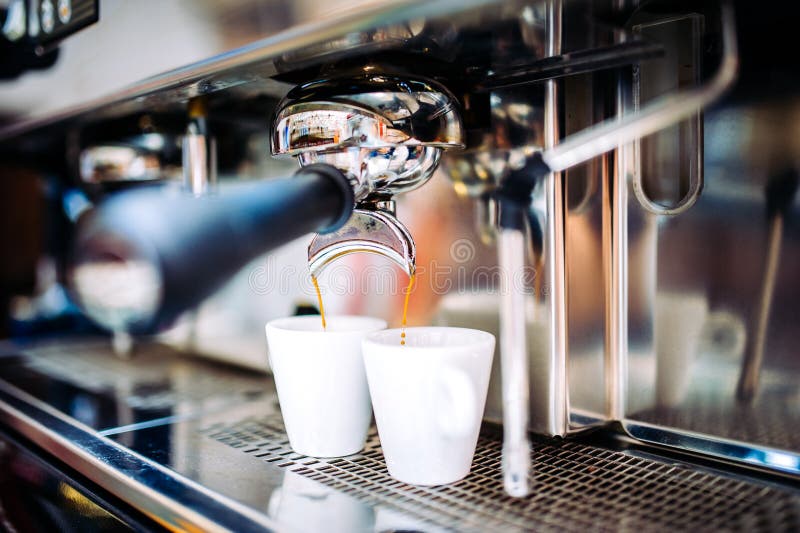 Industrial coffee maker preparing fresh espresso at pub and restaurant. Industrial coffee maker preparing fresh espresso at pub and restaurant