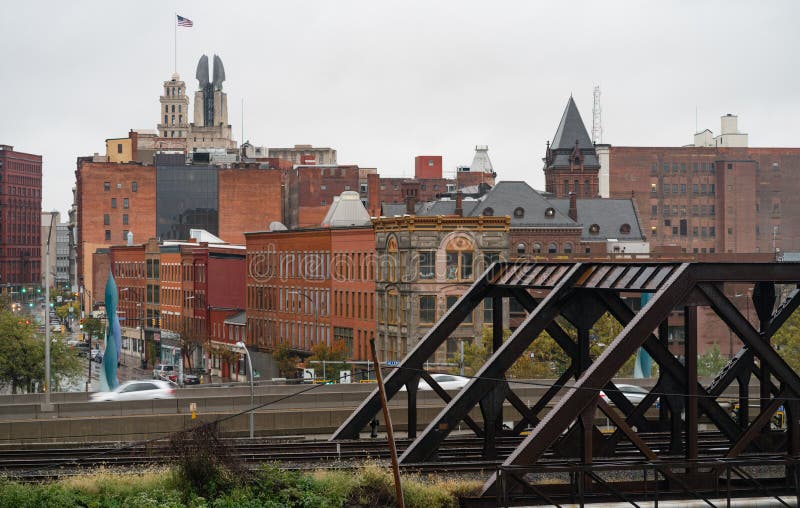 View over the train tracks and highway to the buildings of main street in downtown Rochester New York. View over the train tracks and highway to the buildings of main street in downtown Rochester New York