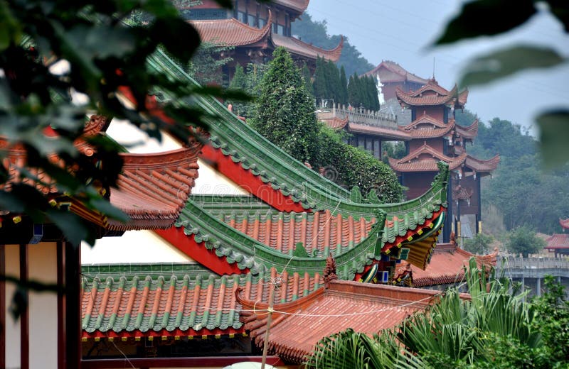 View of hillside pavilions at the Sheng Shui Temple, built along a terraced hillside, parts of which date to the Tang (4-7th century) and Qing (17th century) Dynasties in Mianyang, Sichuan Province, China. View of hillside pavilions at the Sheng Shui Temple, built along a terraced hillside, parts of which date to the Tang (4-7th century) and Qing (17th century) Dynasties in Mianyang, Sichuan Province, China.