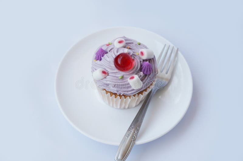 Βούτυρο cupcake στοκ εικόνες με δικαίωμα ελεύθερης χρήσης Βούτυρο cupcake στοκ εικόνες με δικαίωμα ελεύθερης χρήσης