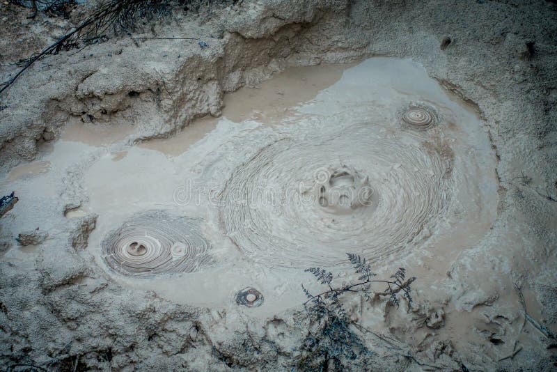 Bubbling Mud releasing Hydrogen Sulphide Gas. Geothermal Activity in Waitapu, New Zealand. Bubbling Mud releasing Hydrogen Sulphide Gas. Geothermal Activity in Waitapu, New Zealand.