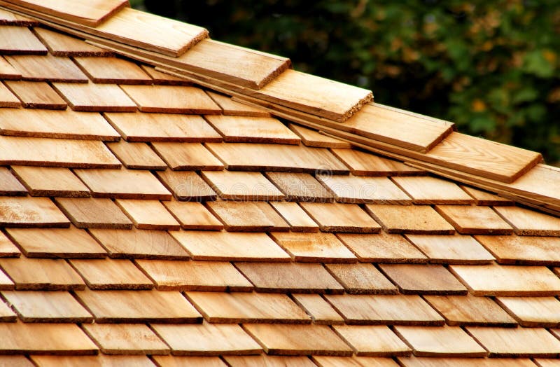 Layers of cedar shingles on roof. Layers of cedar shingles on roof