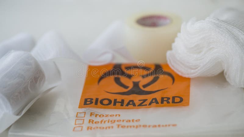Γάζα, ταινία και biohazard τσάντα στοκ εικόνες Γάζα, ταινία και biohazard τσάντα στοκ εικόνες