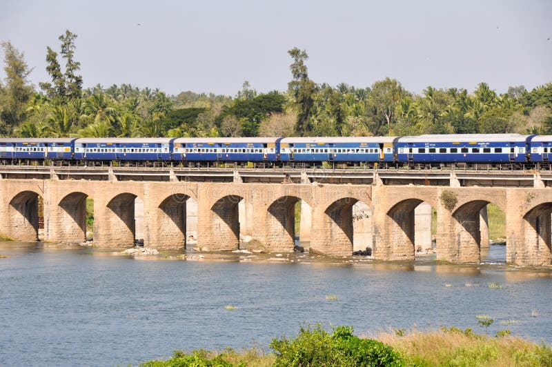 Train over a bridge in Srirangapatna, India. Train over a bridge in Srirangapatna, India