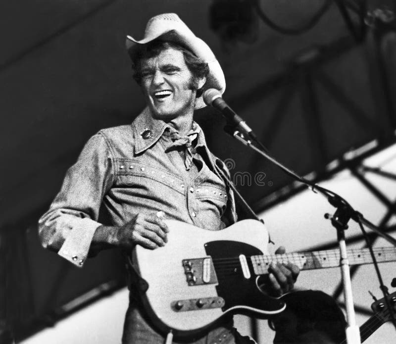 Country music singer, guitarist, and film actor, Jerry Reed, is having a good old time performing at Chicagofest in Chicago, Illinois, in August of 1979. Reed was born in Georgia on March 20, 1937 and died in Nashville, Tennessee on September 1, 2008 at 71. He received a Grammy for performing his hit single, &#x22;When You&#x27;re Hot, You&#x27;re Hot.&#x22; Reed was well known for his acting role in &#x22;Smokey and the Bandit.&#x22;. Country music singer, guitarist, and film actor, Jerry Reed, is having a good old time performing at Chicagofest in Chicago, Illinois, in August of 1979. Reed was born in Georgia on March 20, 1937 and died in Nashville, Tennessee on September 1, 2008 at 71. He received a Grammy for performing his hit single, &#x22;When You&#x27;re Hot, You&#x27;re Hot.&#x22; Reed was well known for his acting role in &#x22;Smokey and the Bandit.&#x22;