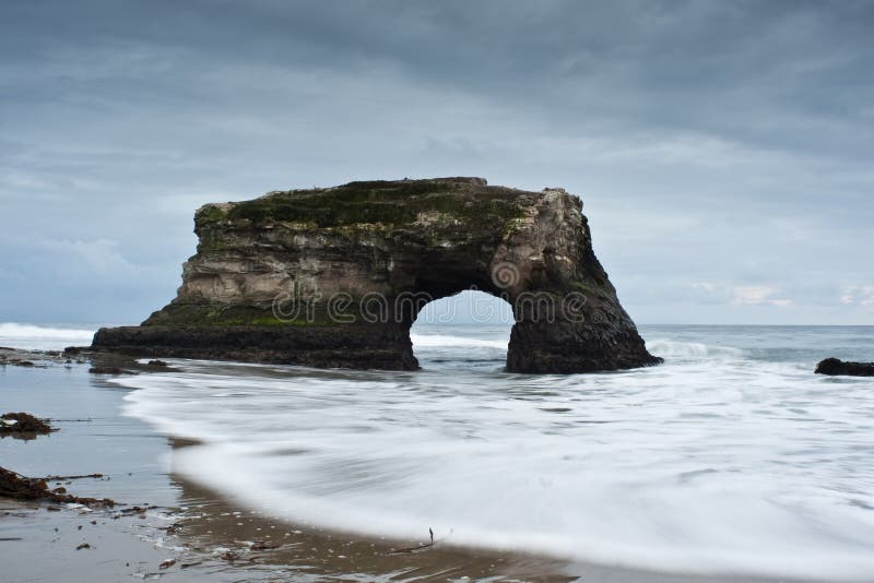 Stormy sunset at Natural Bridges State Park. Stormy sunset at Natural Bridges State Park.