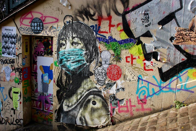 Γκράφιτι του κοριτσιού στο facemask στην οδό του Παρισιού στοκ εικόνα με δικαίωμα ελεύθερης χρήσης Γκράφιτι του κοριτσιού στο facemask στην οδό του Παρισιού στοκ εικόνα με δικαίωμα ελεύθερης χρήσης