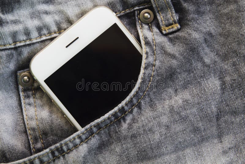 Γκρίζα τσέπη τζιν με το άσπρο smartphone Εκλεκτής ποιότητας ενδυμασία μόδας τζιν στοκ εικόνα Γκρίζα τσέπη τζιν με το άσπρο smartphone Εκλεκτής ποιότητας ενδυμασία μόδας τζιν στοκ εικόνα