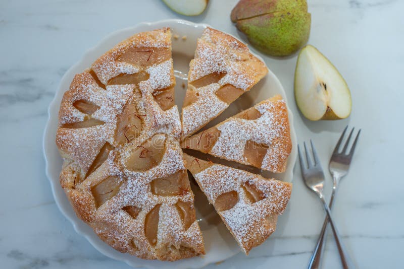 sweet home made french vanilla pear pie on a table. sweet home made french vanilla pear pie on a table