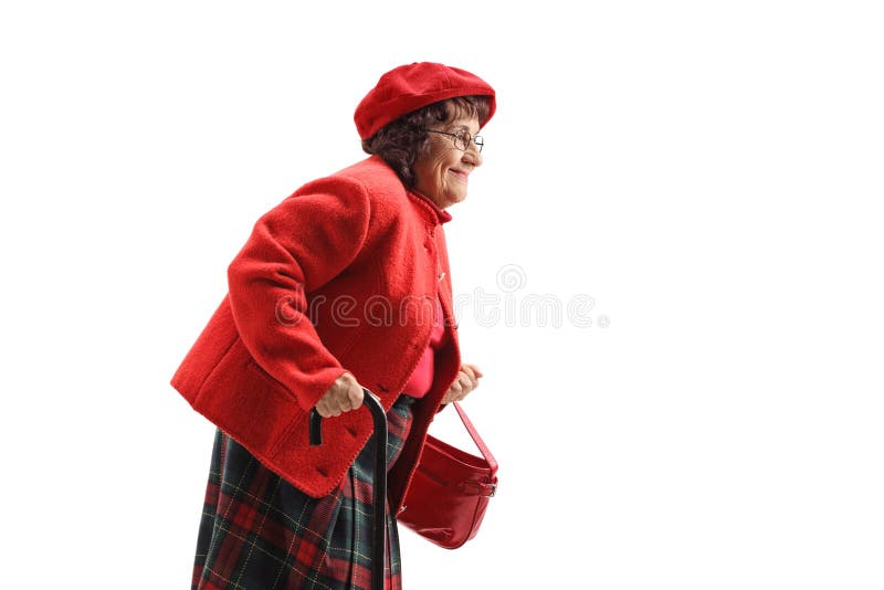 γριά γυναίκα περπατάει με μπαστούνι