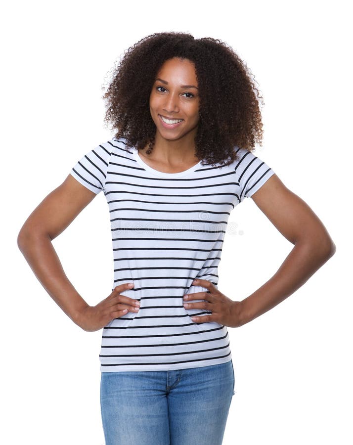 Portrait of a beautiful young woman with curly hair smiling with hands on hip. Portrait of a beautiful young woman with curly hair smiling with hands on hip