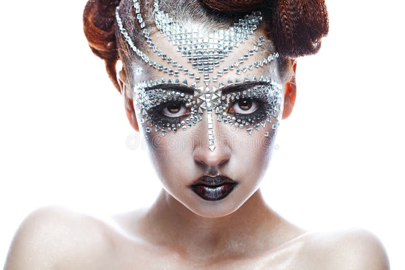 Γυναίκα ομορφιάς στο φουτουριστικό makeup στοκ φωτογραφία