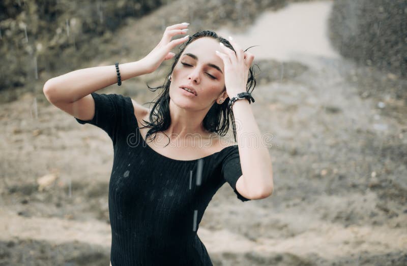 Woman in rain. Picture emotion woman. Mood with girls beach. Sad female mood. Woman emotions. Woman in rain. Picture emotion woman. Mood with girls beach. Sad female mood. Woman emotions